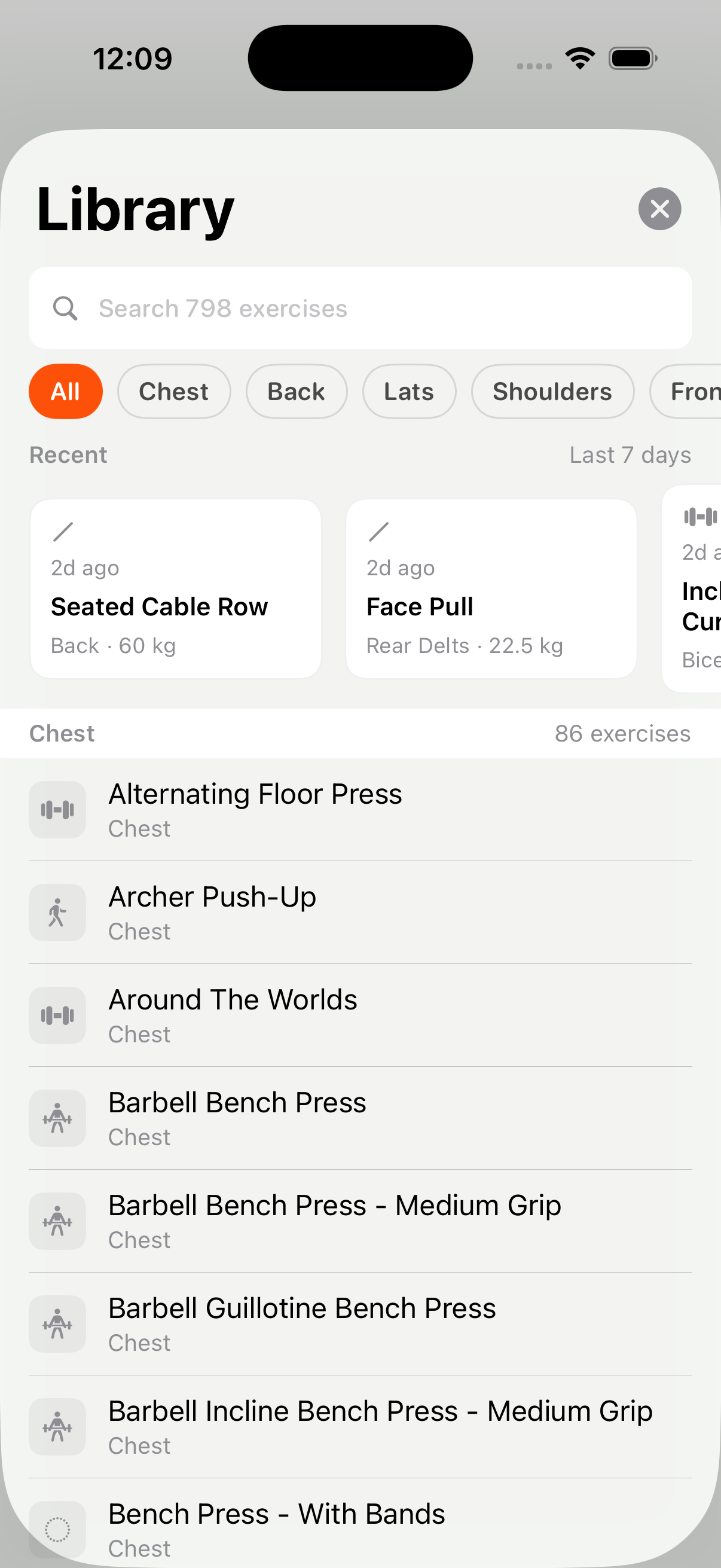 Exercise library with search bar, muscle group filter chips, and list showing 86+ chest exercises with equipment info